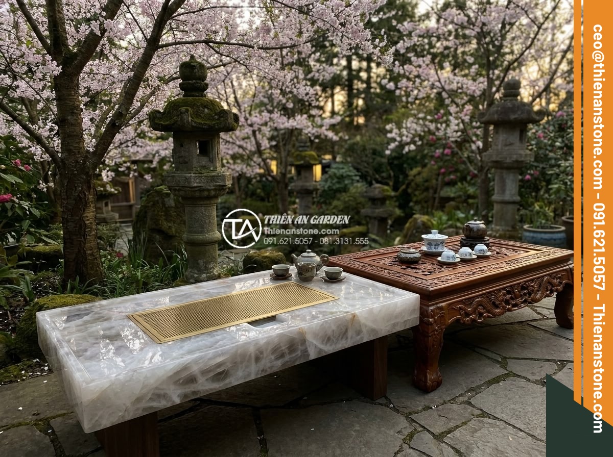 So sánh bàn trà đá nguyên khối và bàn trà gỗ: Lựa chọn nào cho sân vườn? - Elegant comparison of a polished solid stone tea table with modern minimalist de