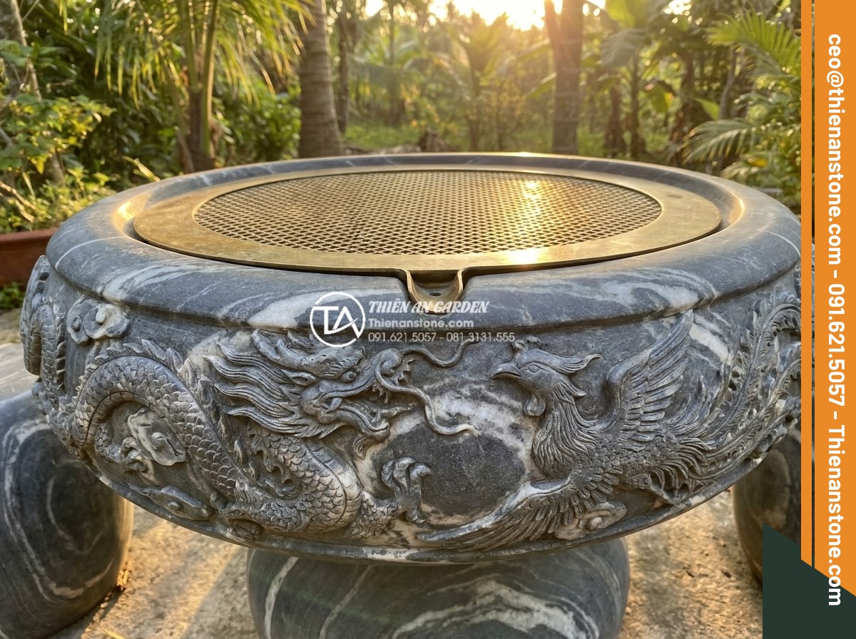 So sánh bàn trà đá nguyên khối và bàn trà gỗ: Lựa chọn nào cho sân vườn? - Stunning close-up of a masterfully carved solid stone tea table pedestal with dr
