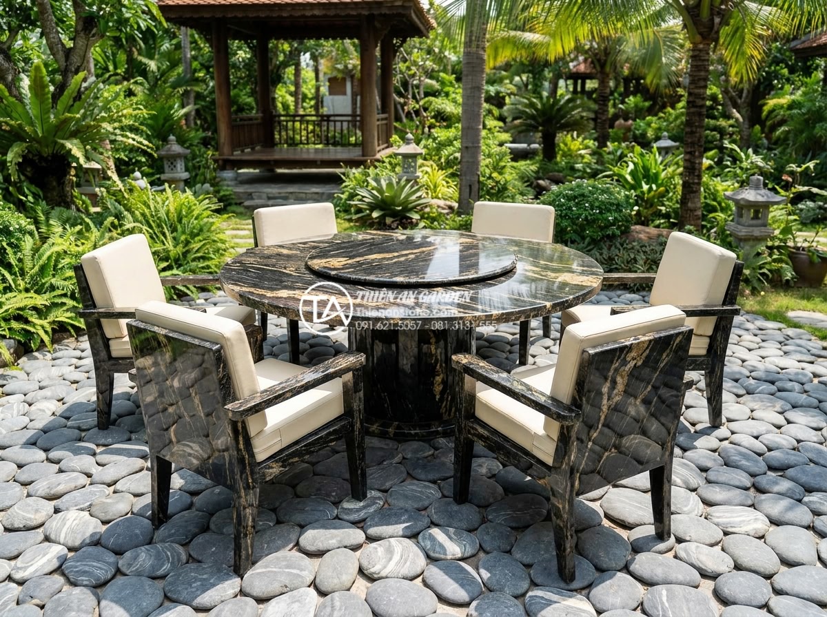 Tại sao bàn ghế đá hoa cương thường bị nứt khi để ngoài trời và cách khắc phục? - Hình 1 Tại sao bàn ghế đá hoa cương thường bị nứt khi để ngoài trời và cách khắc phục? - High resolution professional photograph of a luxurious outdoor granite dining se