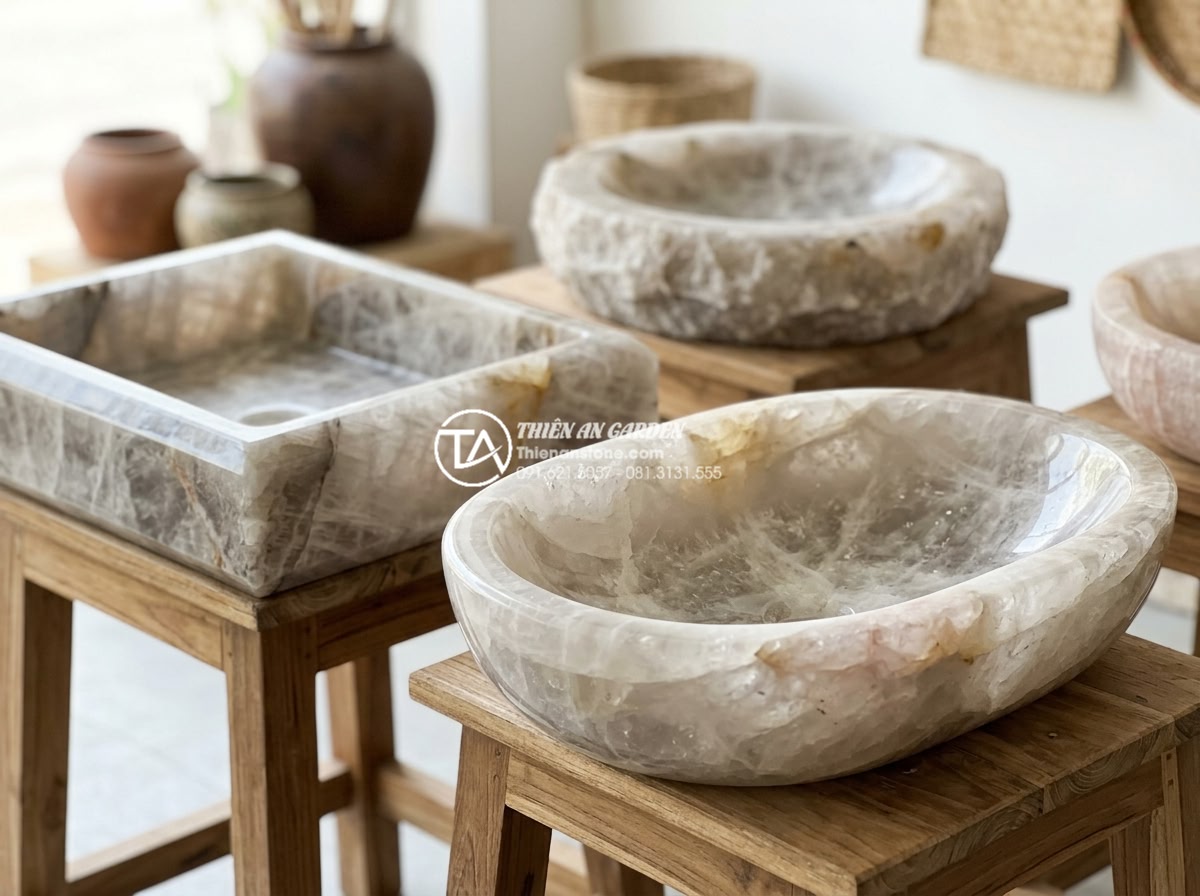 Tại Sao Lavabo Đá Kanly Được Ưa Chuộng Trong Kiến Trúc Đông Dương (Indochine)? - Close-up detail shot of various Kanly stone lavabo shapes including oval, rectan