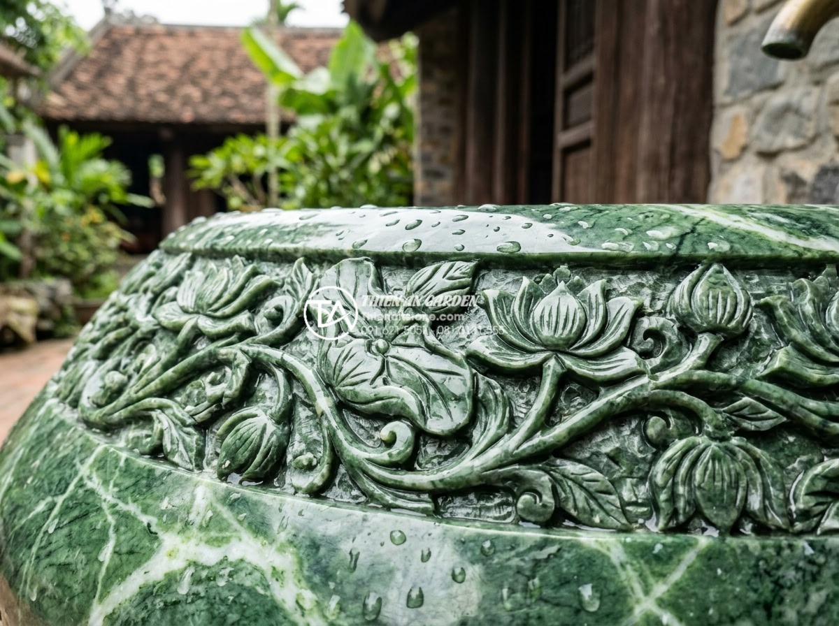 Tại Sao Lavabo Đá Kanly Được Ưa Chuộng Trong Kiến Trúc Đông Dương (Indochine)? - Macro photography of intricate hand-carved floral and leaf motifs on a premium K