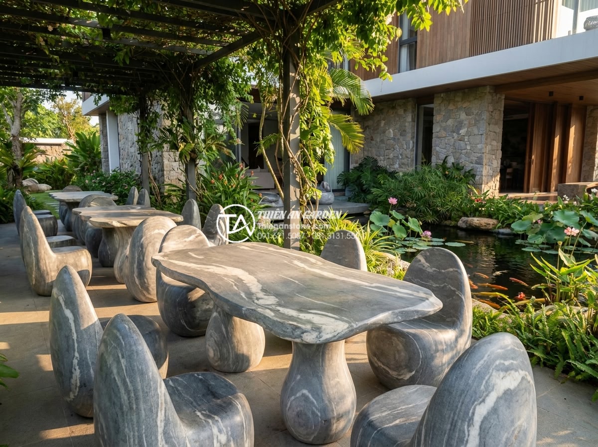 Tổng hợp các mẫu bàn ghế đá tự nhiên vân gỗ độc đáo nhất thế giới - A breathtaking wide-angle photograph of an outdoor luxury garden setting featuri