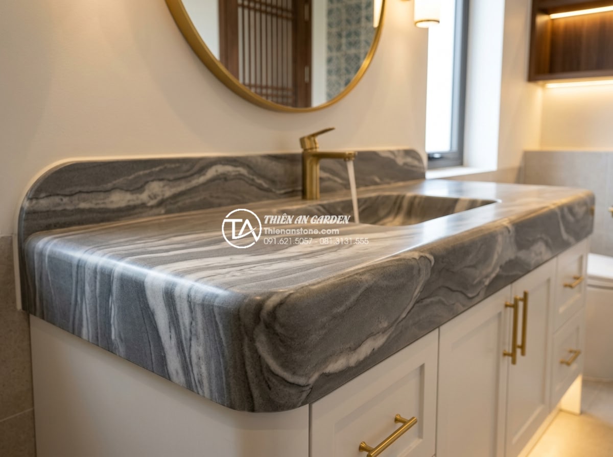 Top 10 Mẫu Bàn Đá Lavabo Đẹp Chinh Phục Mọi Ánh Nhìn Năm 2026 - Side angle view of Carrara marble stone vanity top highlighting the unique golde