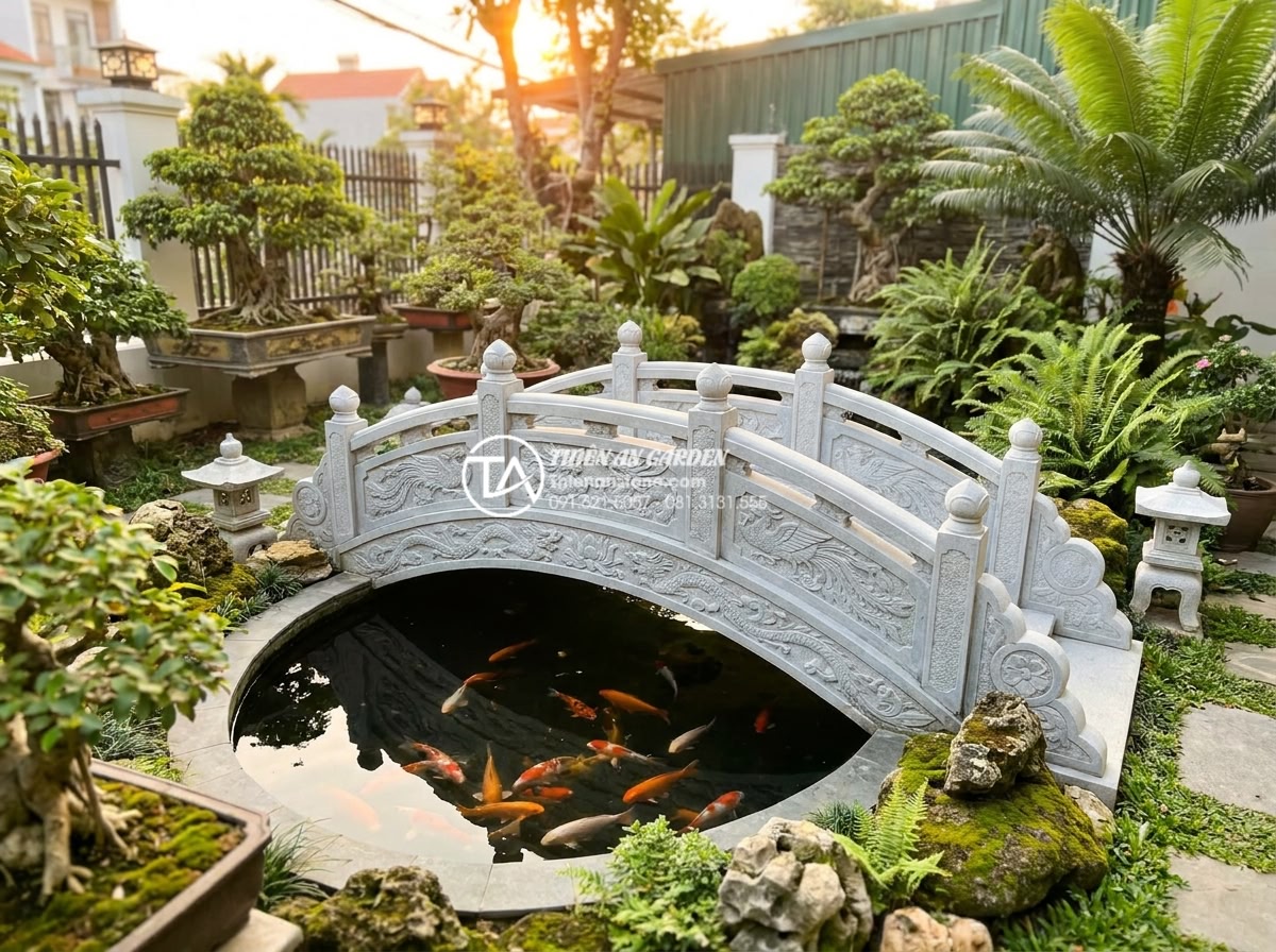 Top 5 mẫu cầu đá mini cho sân vườn diện tích nhỏ và nhà phố - Hình 3 Top 5 mẫu cầu đá mini cho sân vườn diện tích nhỏ và nhà phố - Stunning wide shot of traditional Vietnamese style miniature stone bridge with i