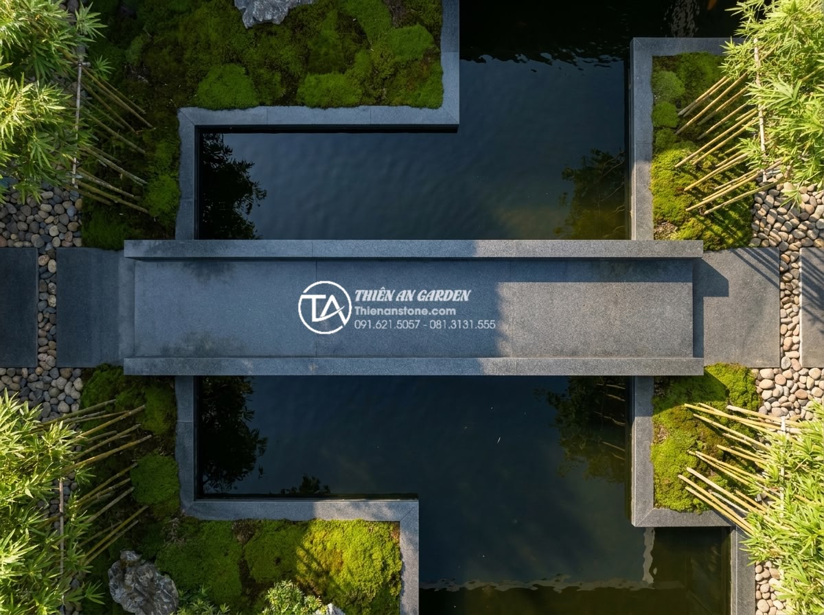Xu hướng thiết kế cầu sân vườn 2026: Sự lên ngôi của phong cách tối giản - Aerial view of a sleek minimalist stone garden bridge made from polished natural