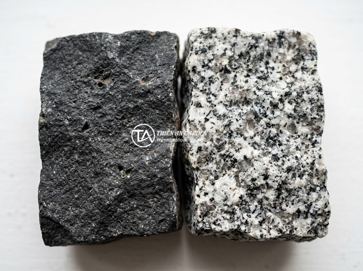 Bảng hiệu đá bazan và granite: Đặc điểm và ứng dụng trong làm biển hiệu công ty - Hình 1 Bảng hiệu đá bazan và granite: Đặc điểm và ứng dụng trong làm biển hiệu công ty - Close-up comparison of natural basalt stone and granite stone surfaces showing t