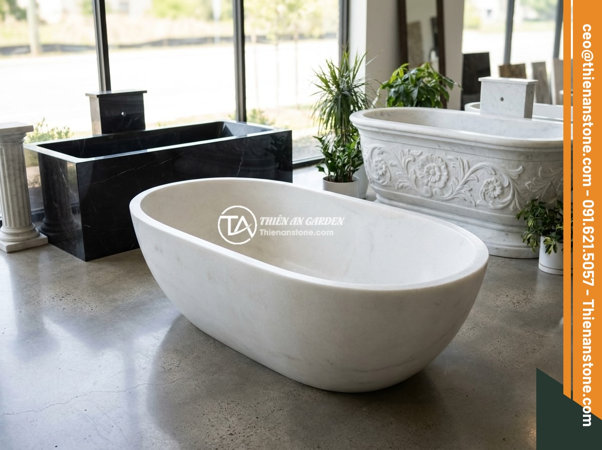 Bồn Tắm Đá Cẩm Thạch Sang Trọng: Đặc Điểm, Bảo Dưỡng Và Báo Giá 2026 - A collection of three different marble bathtub designs displayed in a showroom: 