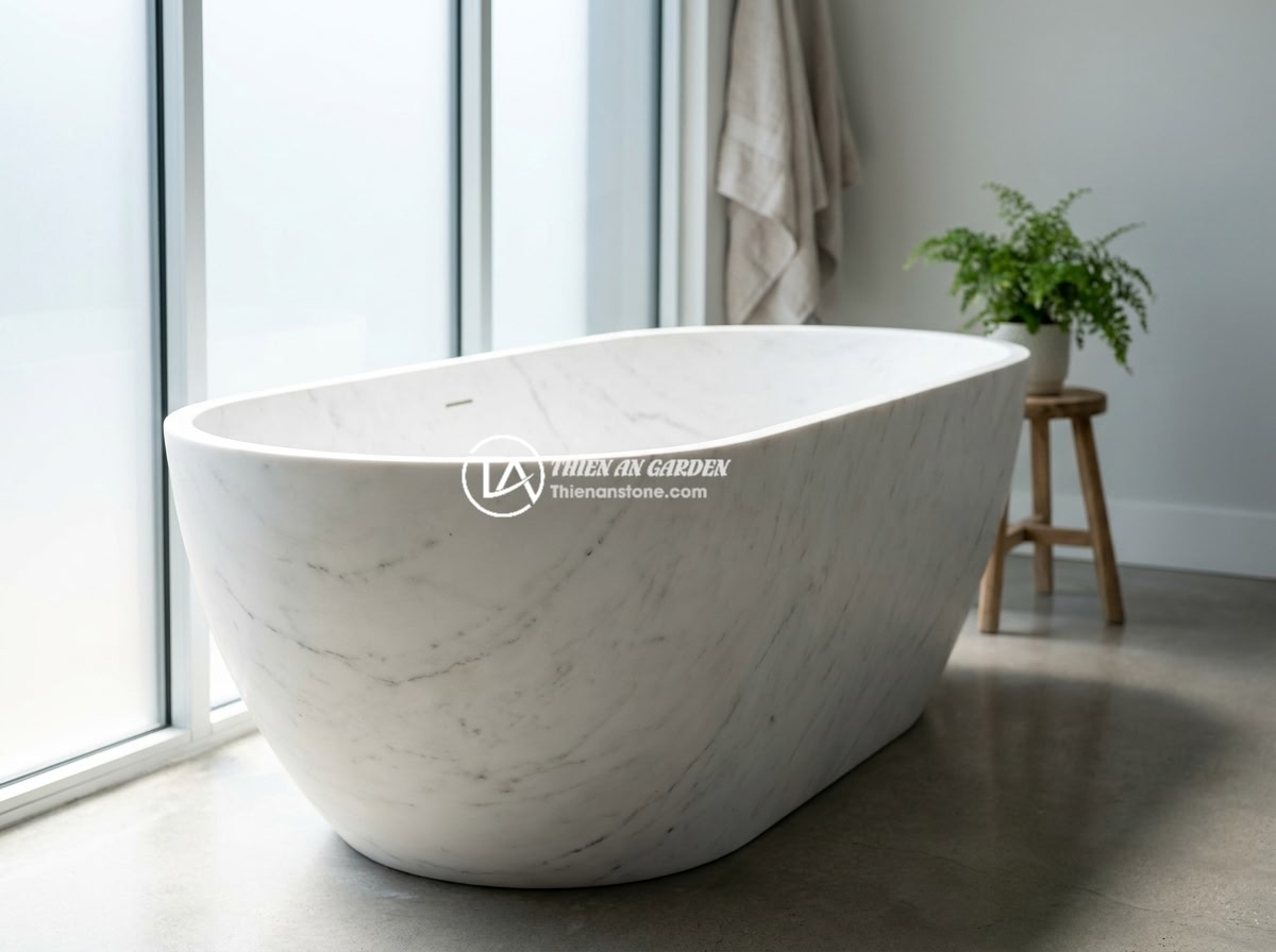 Bồn Tắm Đá Nhân Tạo Solid Surface Có Tốt Không? So Với Đá Tự Nhiên - Elegant freestanding solid surface bathtub in a modern minimalist bathroom with 
