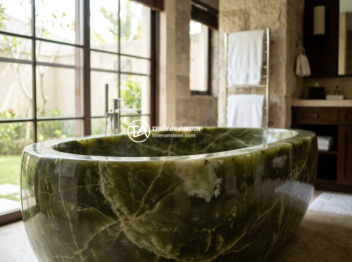 Bồn Tắm Đá Nhân Tạo Solid Surface Có Tốt Không? So Với Đá Tự Nhiên - Luxurious natural marble bathtub carved from a single block of white Carrara mar