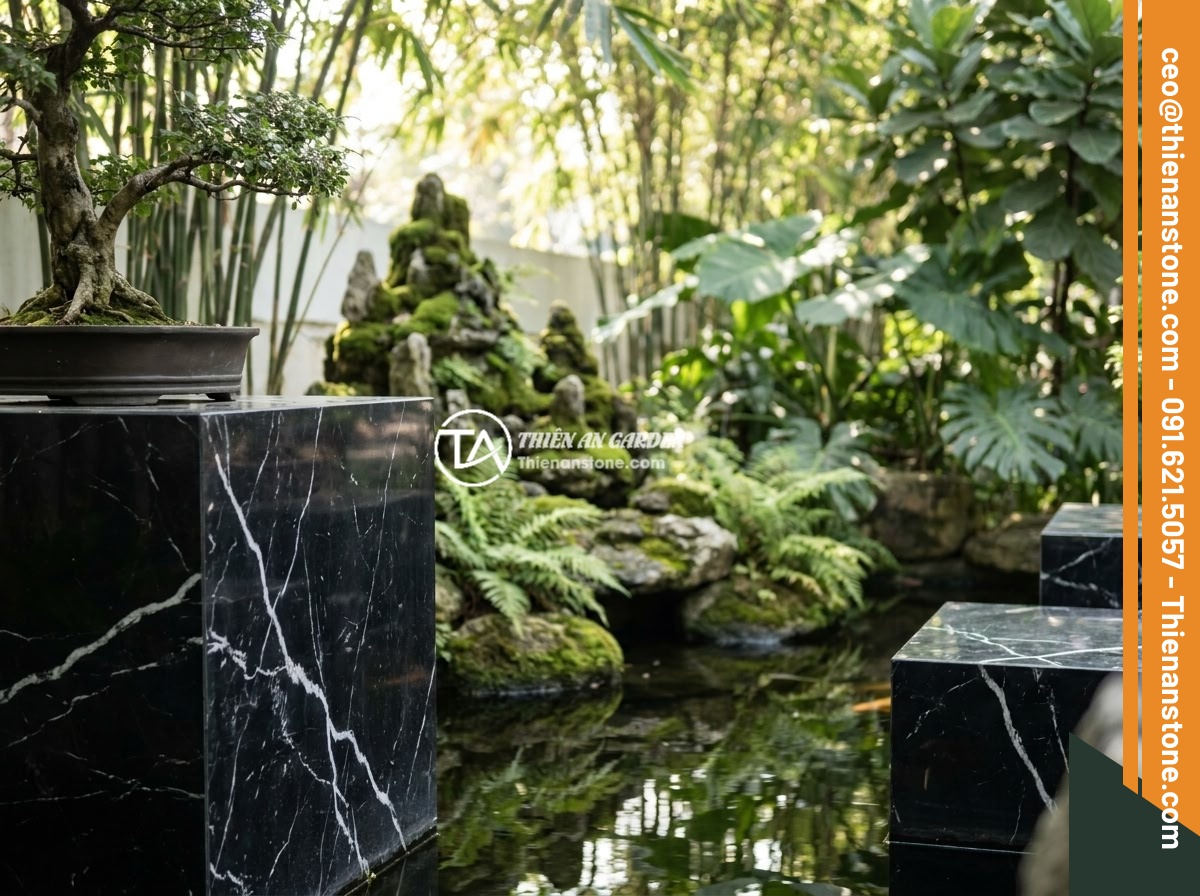 Đôn đá kê tượng phong thủy: Cách chọn và đặt vị trí mang lại tài lộc, bình an - A serene Japanese-Vietnamese fusion garden with natural stone pedestals placed s