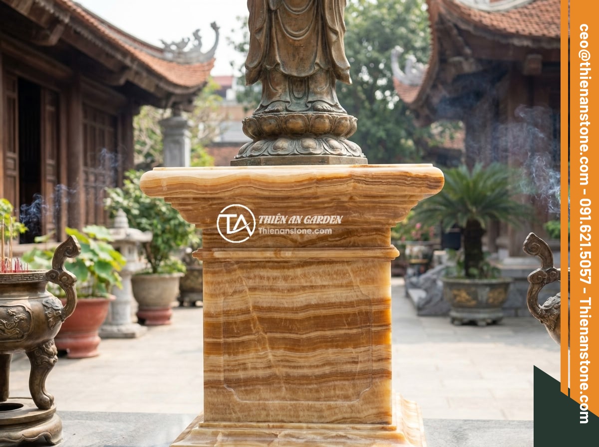 Hướng dẫn thi công lắp đặt đôn đá kê tượng chi tiết từng bước an toàn - A beautifully completed stone pedestal installation in a Vietnamese temple court
