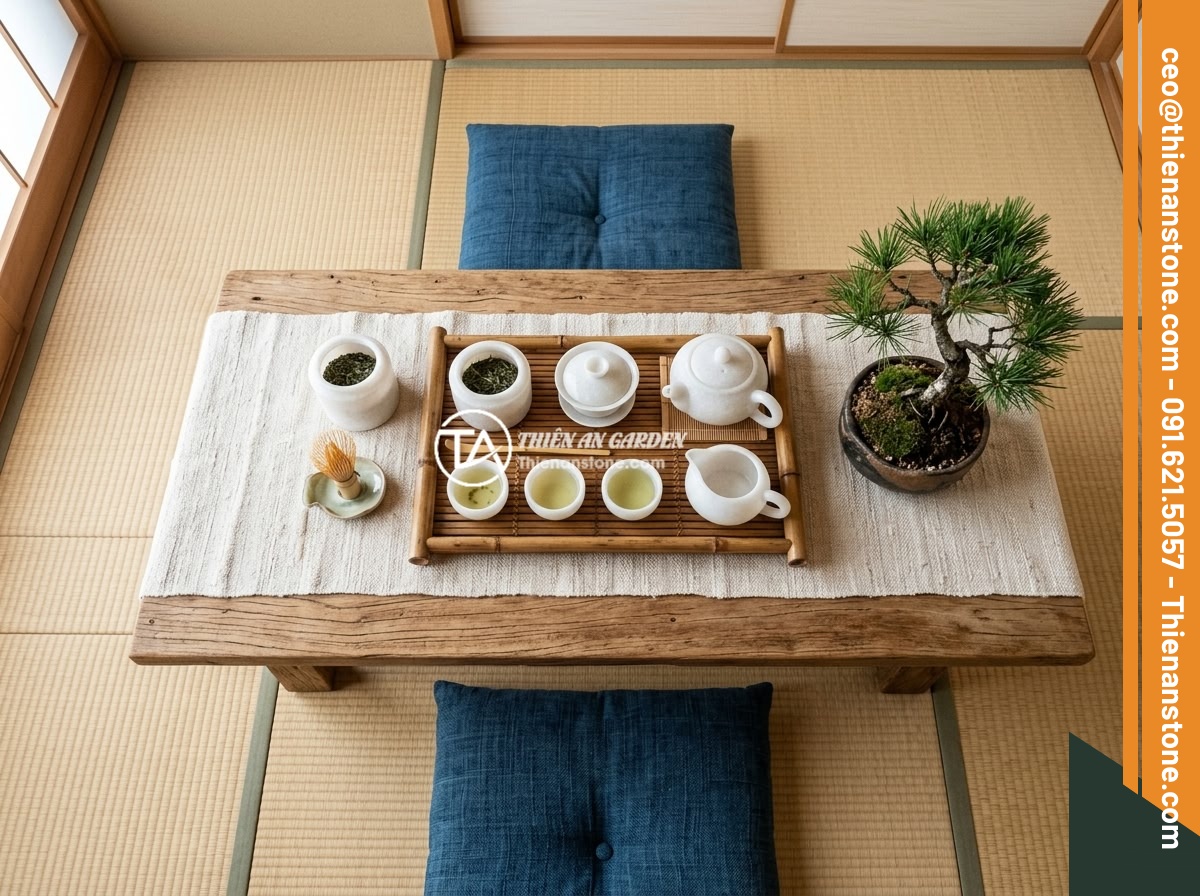 Kết hợp bộ ấm chén đá với nội thất phong cách tối giản zen - A complete zen tea corner setup viewed from above, showing all elements: low woo
