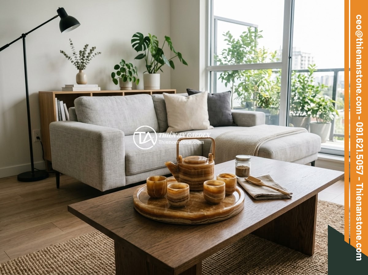 Kinh nghiệm pha trà ngon và chuẩn vị với ấm chén đá tự nhiên - A modern minimalist living room interior with a natural stone tea set elegantly 