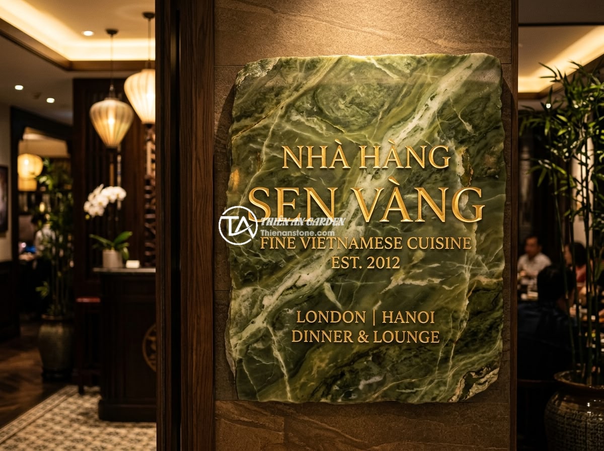 Lỗi chữ trên bảng hiệu đá bị phai màu nhanh: Nguyên nhân và cách khắc phục bền vững - Hình 10 Lỗi chữ trên bảng hiệu đá bị phai màu nhanh: Nguyên nhân và cách khắc phục bền vững - Elegant indoor stone signboard with perfectly maintained golden letters at the e
