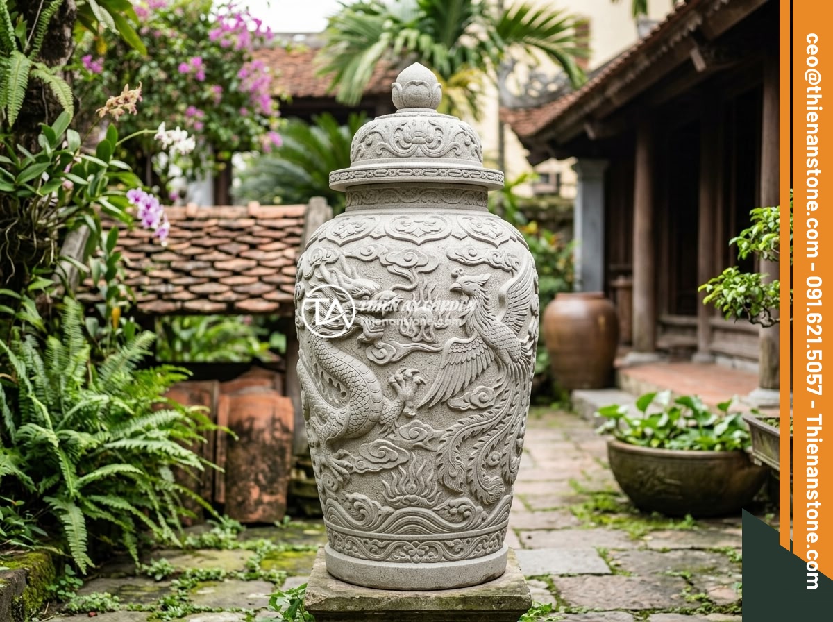 Nguyên nhân chum đá phong thủy bị nứt rạn và cách xử lý chuyên nghiệp - A luxurious natural stone feng shui jar with intricate dragon and phoenix carvin