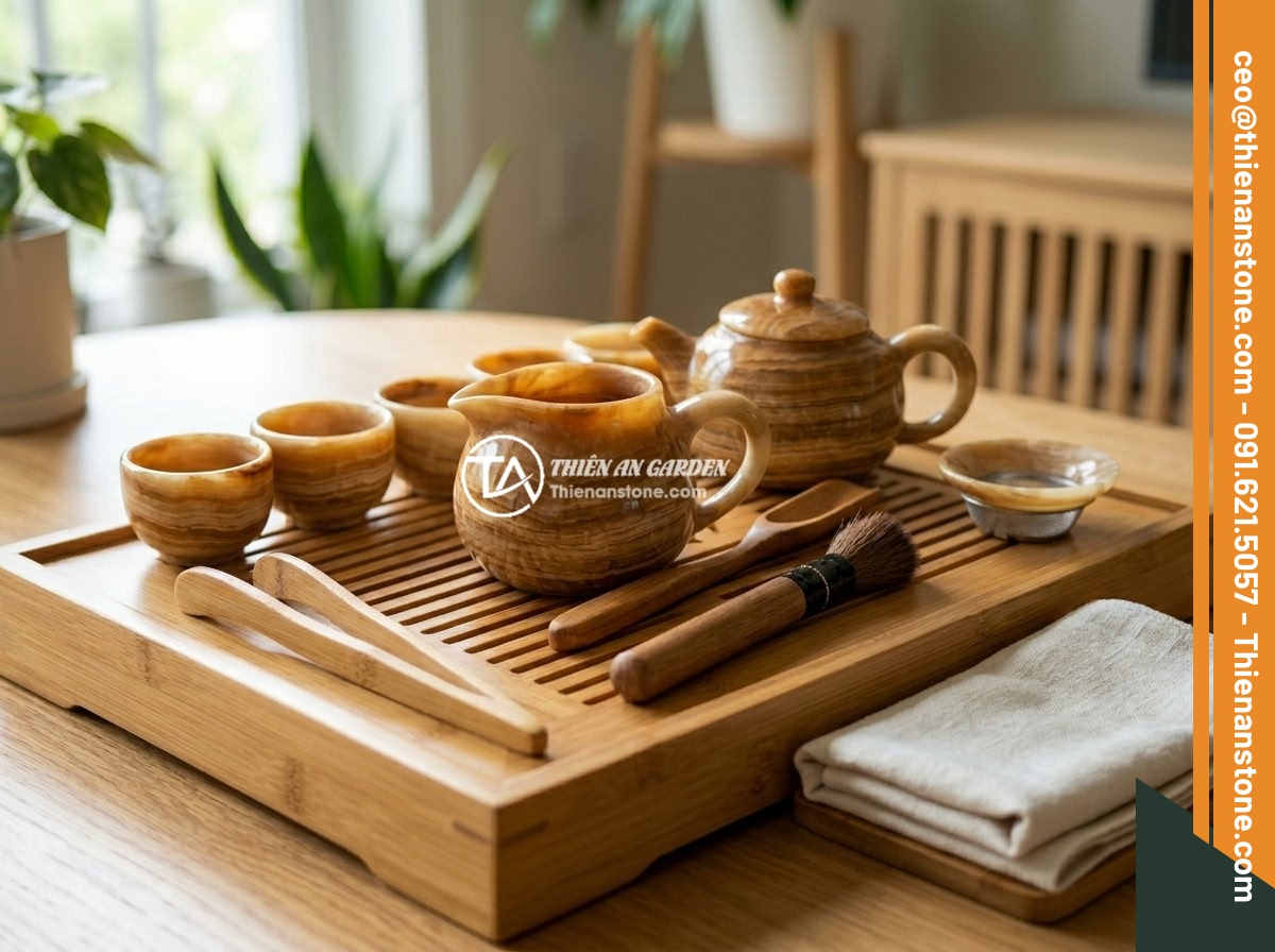 Quà tặng cao cấp 2026: Tại sao bộ ấm chén đá quý lại được lựa chọn nhiều - A beautifully maintained stone tea set on a bamboo tea tray with all accessories