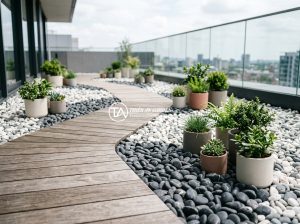 Sỏi Trang Trí Sân Thượng: Biến Không Gian Trống Thành Vườn Thư Giãn - Rooftop garden decorated with white and grey pebbles, wooden deck path, small gr