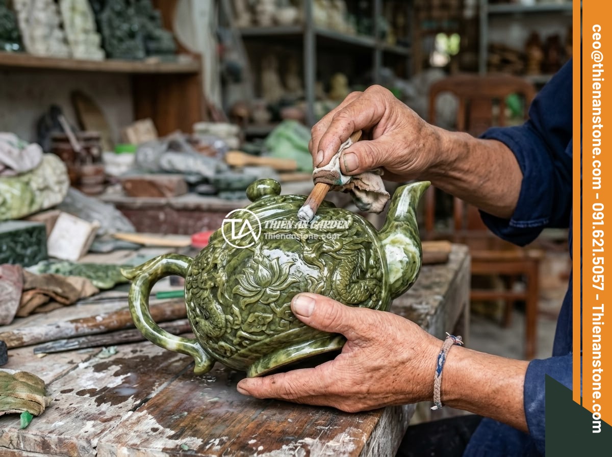 Top 8 bộ ấm chén bằng đá sang trọng và đẹp nhất cho không gian sống 2026 - Close-up of a craftsman hand-polishing a natural jade stone teapot with intricat