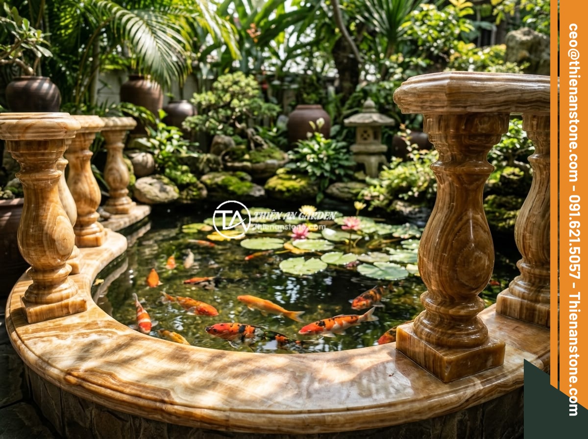 7 Ý Tưởng Thiết Kế Lan Can Lục Bình Đá Cho Sân Vườn Nhỏ, Không Gian Hạn Chế - Hình 4 7 Ý Tưởng Thiết Kế Lan Can Lục Bình Đá Cho Sân Vườn Nhỏ, Không Gian Hạn Chế - A miniature Koi fish pond surrounded by ornate stone balusters in a compact Viet