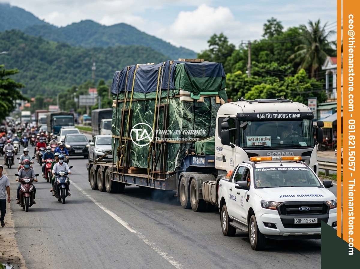 Case Study Thực Tế Thi Công Sập Đá Nguyên Khối Cho Biệt Thự Miền Bắc Việt Nam - Heavy-duty transport truck carrying a massive wrapped monolithic stone slab on a
