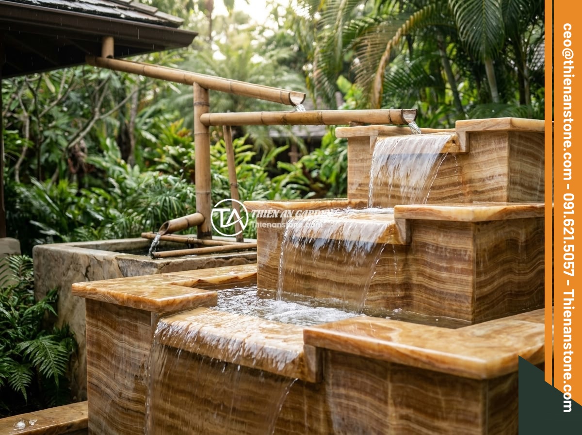 Đài Phun Nước Bằng Đá Bị Tắc Nước: Nguyên Nhân Phổ Biến Và Cách Sửa Nhanh - A natural stone fountain in a tropical garden with a rainwater collection system