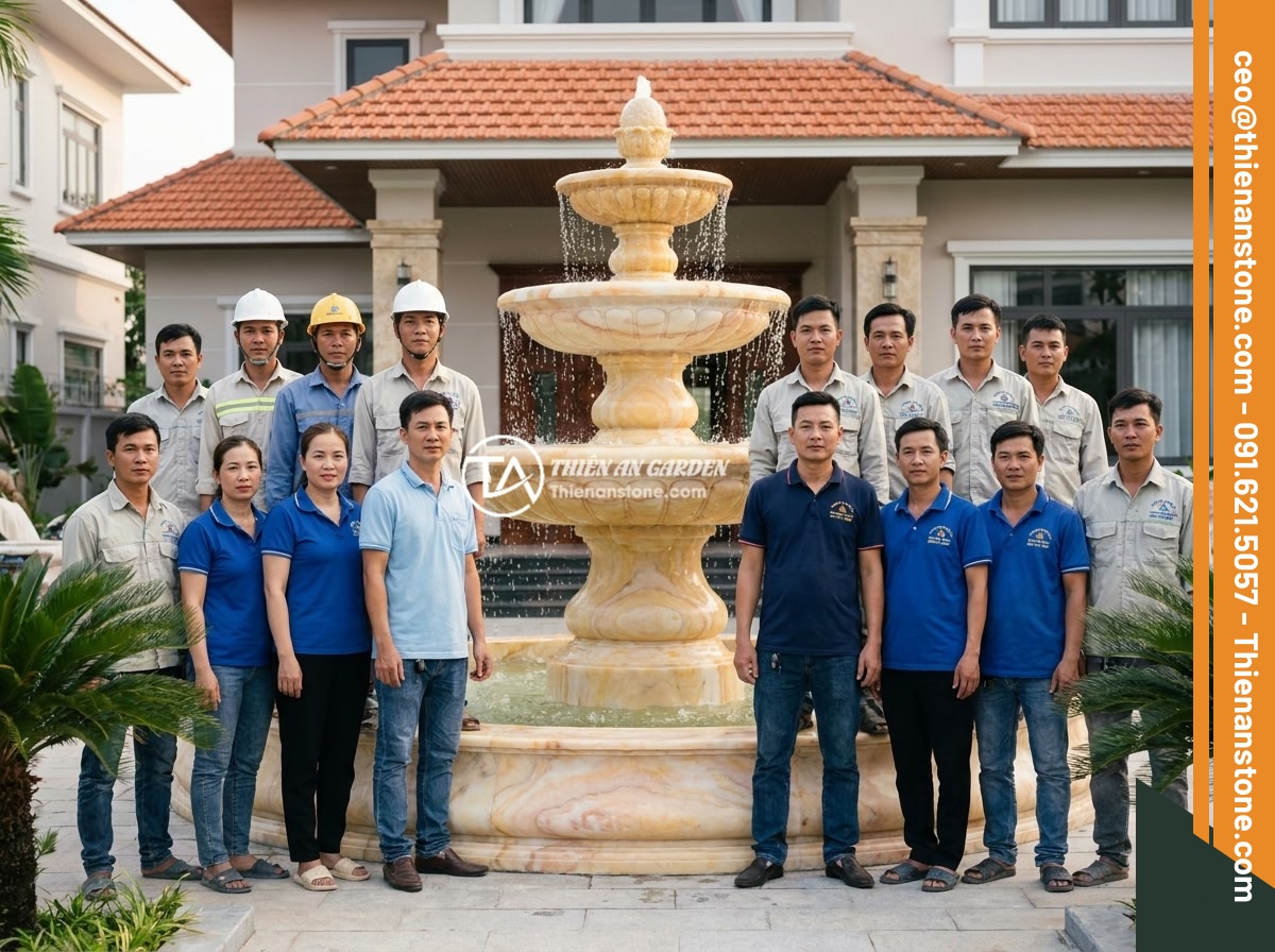 Đài Phun Nước Bằng Đá Năng Lượng Mặt Trời: Xu Hướng Xanh Thông Minh 2026 - The Thien An Stone company team photo showing skilled stone artisans and solar e