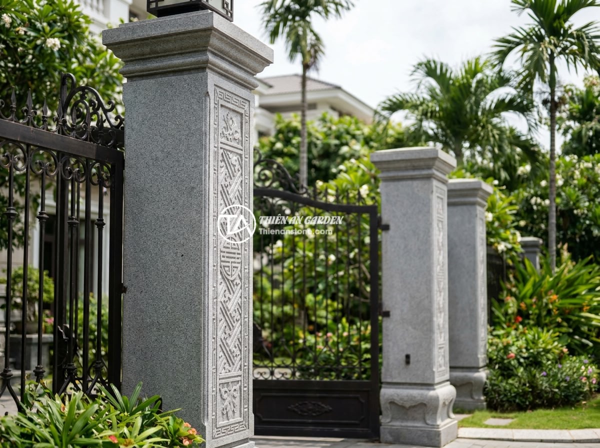 FAQ Trụ Đá Hàng Rào: 15 Câu Hỏi Thường Gặp Và Câu Trả Lời Chi Tiết - Luxurious natural stone fence pillars lining the entrance of a Vietnamese villa,