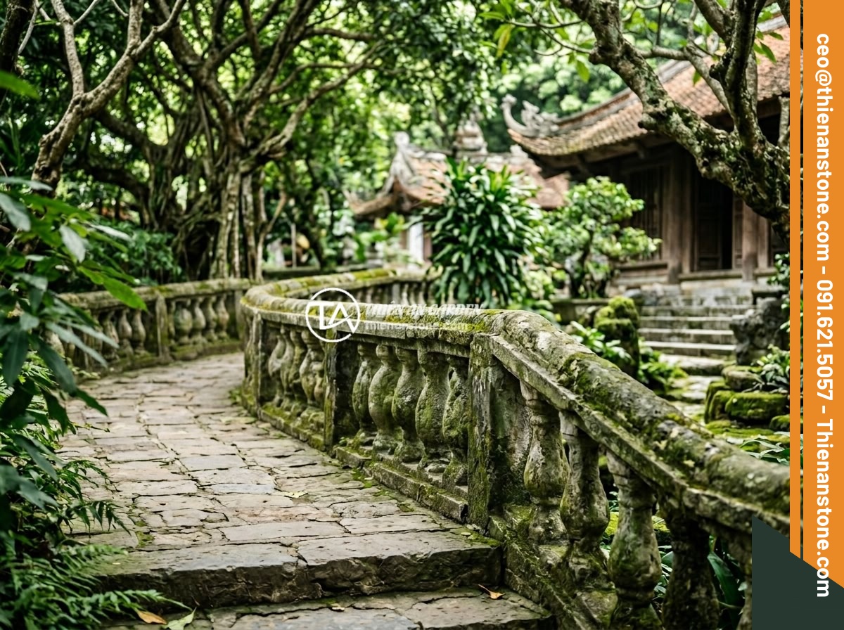 Giá Lục Bình Đá Bao Nhiêu Tiền? Bảng Giá Cập Nhật 2026 & Yếu Tố Ảnh Hưởng Chi Phí - Hình 10 Giá Lục Bình Đá Bao Nhiêu Tiền? Bảng Giá Cập Nhật 2026 & Yếu Tố Ảnh Hưởng Chi Phí - A beautifully aged natural stone balustrade at a historic Vietnamese temple show