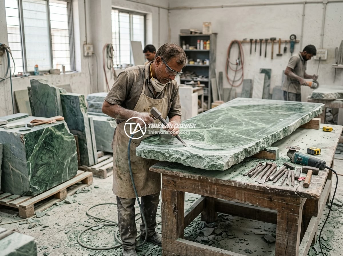Kinh Nghiệm Chọn Mua Sập Đá Tự Nhiên: 8 Tiêu Chí Để Chọn Hàng Chất Lượng Cao - Professional stone carving workshop with artisans hand-crafting a large natural 