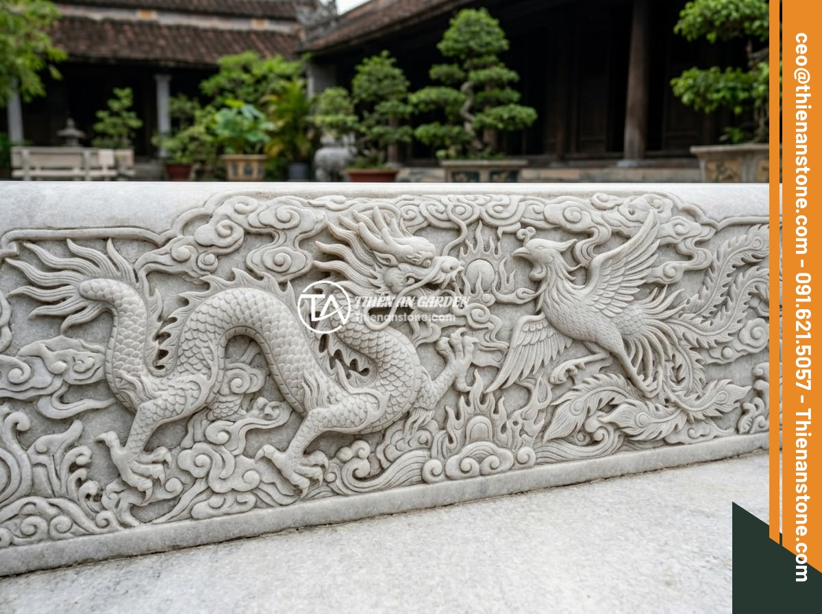 Sập Đá Phong Thủy Sân Vườn: Ý Nghĩa Vị Trí Đặt Hợp Lý Lợi Ích Cho Gia Đình - Hình 8 Sập Đá Phong Thủy Sân Vườn: Ý Nghĩa Vị Trí Đặt Hợp Lý Lợi Ích Cho Gia Đình - Close-up detail of masterfully carved dragon and phoenix patterns on a natural g