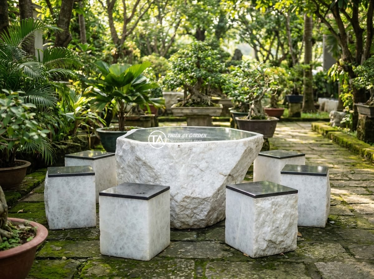 Bàn ghế đá trắng muối - Hình 16 Bàn ghế đá trắng muối - Auspicious white stone table in tranquil garden setting with soft light symboliz