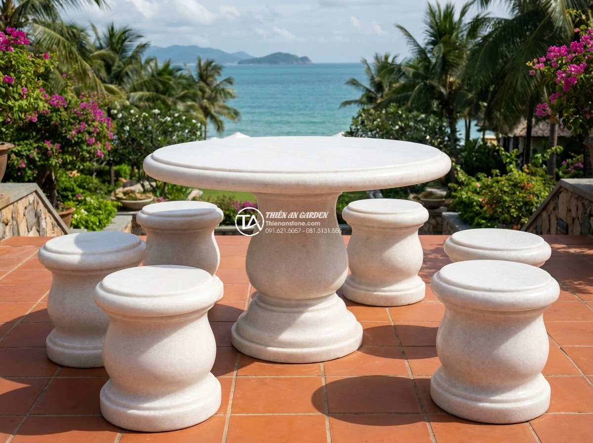 Bàn ghế đá trắng muối - Hình 19 Bàn ghế đá trắng muối - Luxurious villa garden with white salt stone table set on terrace overlooking oc