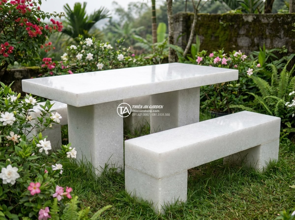 Bàn ghế đá trắng muối - Hình 2 Bàn ghế đá trắng muối - Elegant outdoor white salt stone table set in a serene natural garden with cryst