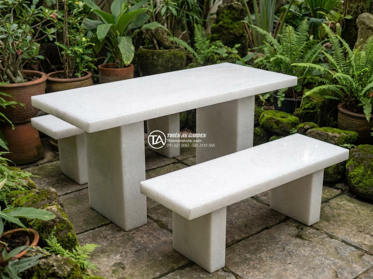Bàn ghế đá trắng muối - Hình 22 Bàn ghế đá trắng muối - Well-maintained white salt stone furniture after years of outdoor use, still loo