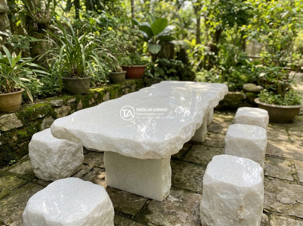 Bàn ghế đá trắng muối - Hình 5 Bàn ghế đá trắng muối - Medium distance realistic view approaching a white salt stone marble garden tabl