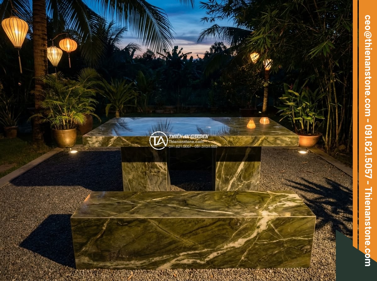 Bàn ghế đá xanh ngọc Serpentine - Hình 10 Bàn ghế đá xanh ngọc Serpentine - Dramatic evening light reflection on Serpentine jade green outdoor stone furnitu