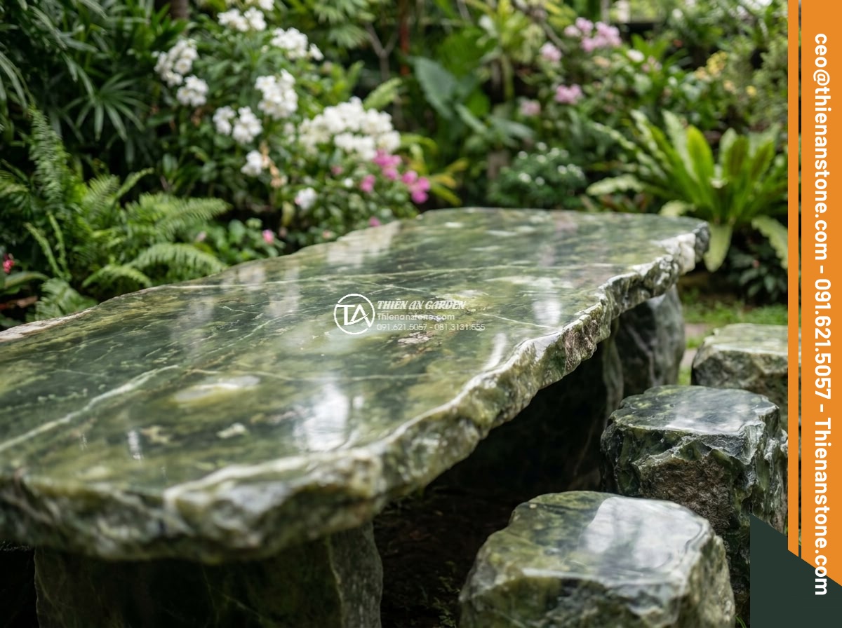 Bàn ghế đá xanh ngọc Serpentine - Hình 3 Bàn ghế đá xanh ngọc Serpentine - Close-up medium shot approaching a Serpentine green jade stone table and chairs