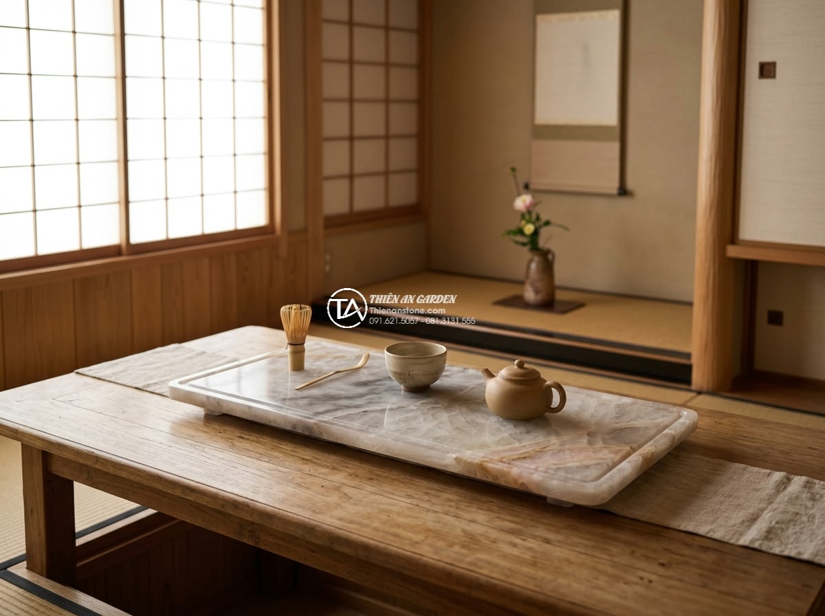 Bàn trà đá cẩm thạch - Hình 10 Bàn trà đá cẩm thạch - Professional photorealistic image of the Đá Cảnh Thiên An workshop showing finis