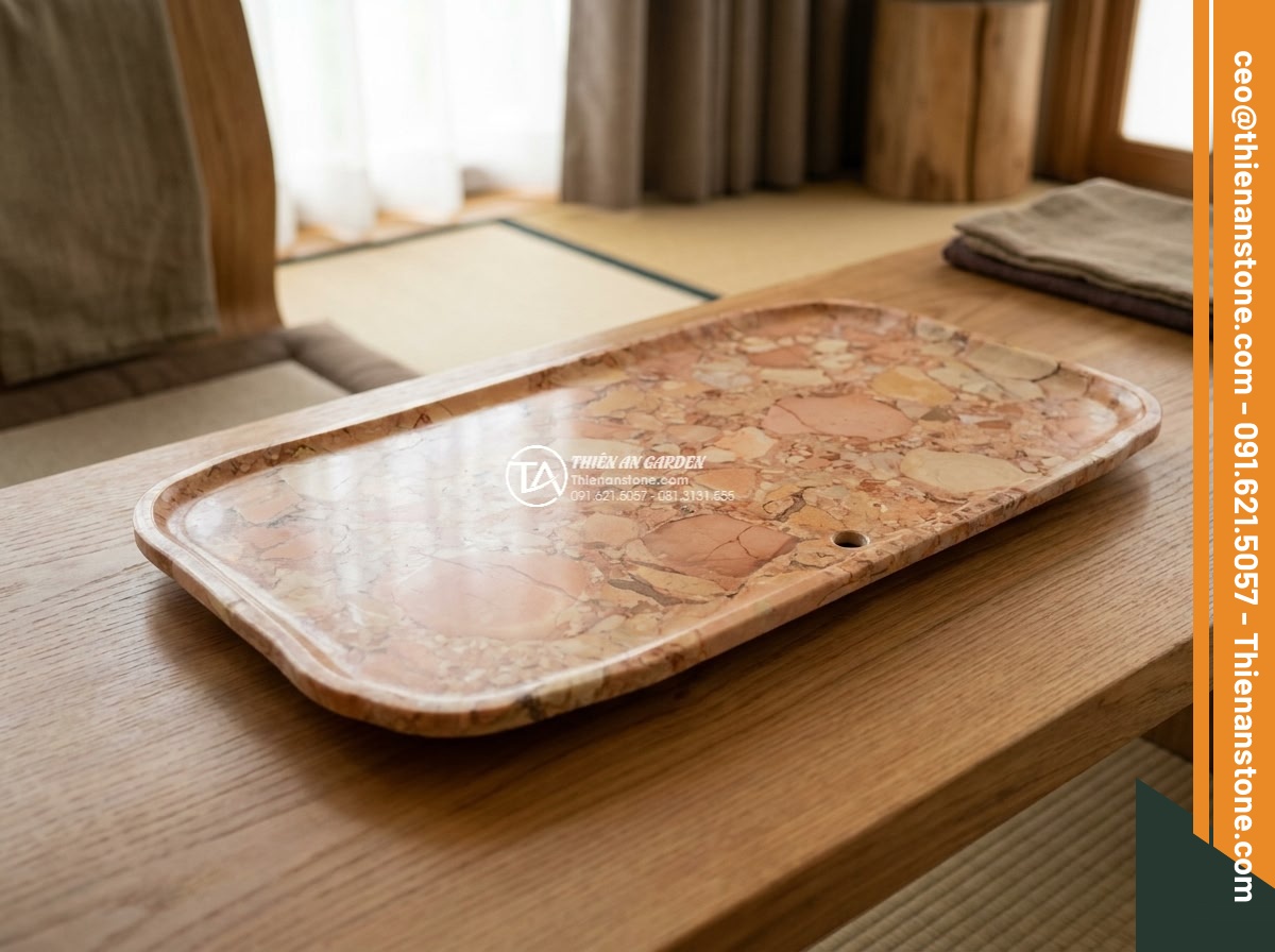 Bàn trà đá huyết long - Hình 3 Bàn trà đá huyết long - Wide shot of elegant blood dragon stone tea table in a luxurious Vietnamese vill