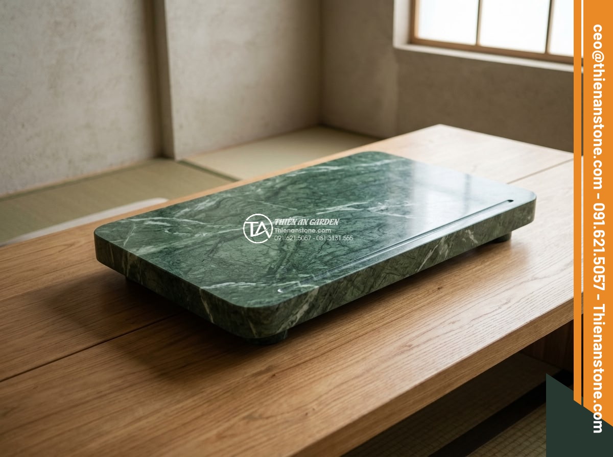 Bàn trà đá xanh Ấn - Hình 15 Bàn trà đá xanh Ấn - Professional team from Da Canh Thien An installing a custom Indian green granite