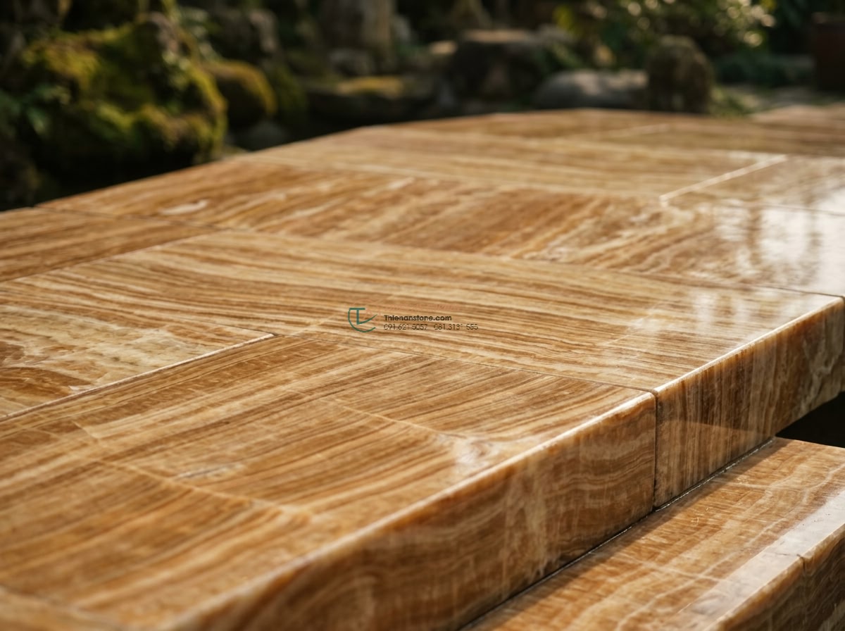Cầu đá vàng vân gỗ giả cổ cho nhà vườn: 150 x 60 x 14 cm. - Hình 3 Cầu đá vàng vân gỗ giả cổ cho nhà vườn: 150 x 60 x 14 cm. - Close-up detailed shot of the yellow stone bridge surface showing intricate real