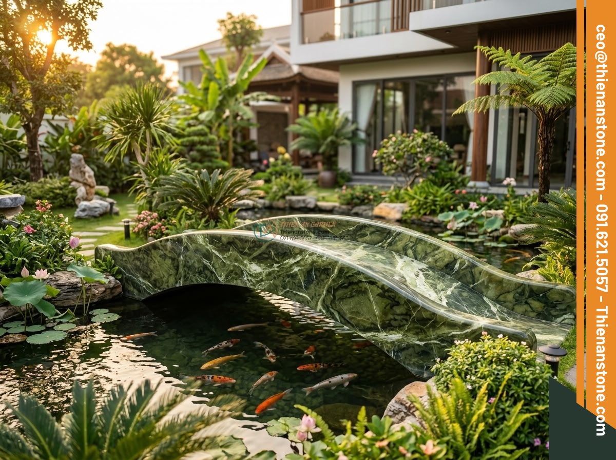Cầu nhỏ trang trí hồ Koi đá ngọc Serpentine: 120 x 50 x 12 cm. - Hình 10 Cầu nhỏ trang trí hồ Koi đá ngọc Serpentine: 120 x 50 x 12 cm. - Happy Vietnamese family relaxing on a beautiful serpentine stone bridge over the