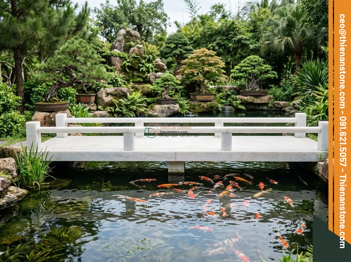 Cầu phiến phẳng đá trắng muối mài bóng bề mặt: 200 x 85 x 20 cm. - Hình 6 Cầu phiến phẳng đá trắng muối mài bóng bề mặt: 200 x 85 x 20 cm. - Serene koi pond with colorful Japanese koi fish swimming under a polished white