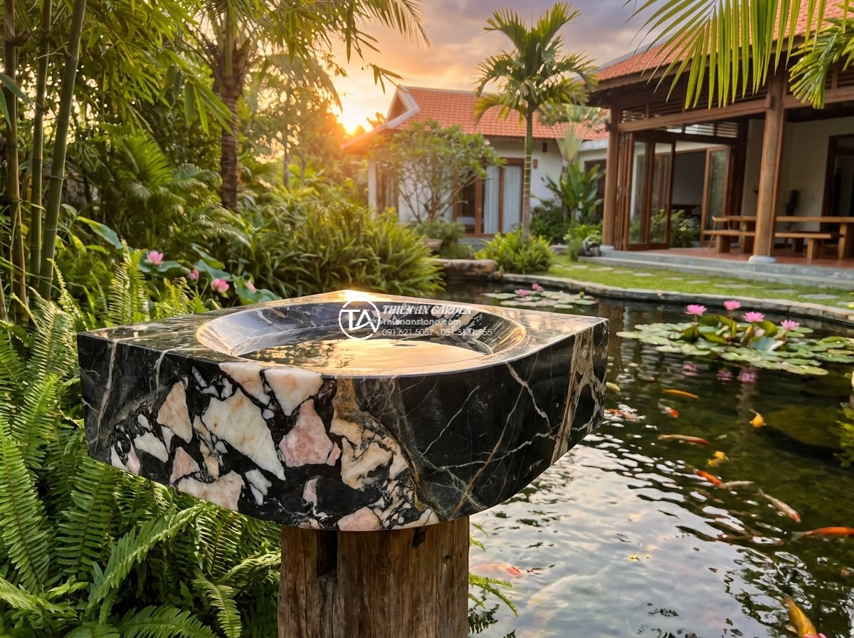 Lavabo đá da báo đỏ góc (400x400x150mm) - Cinematic wide angle view of a luxurious corner red leopard skin stone lavabo si