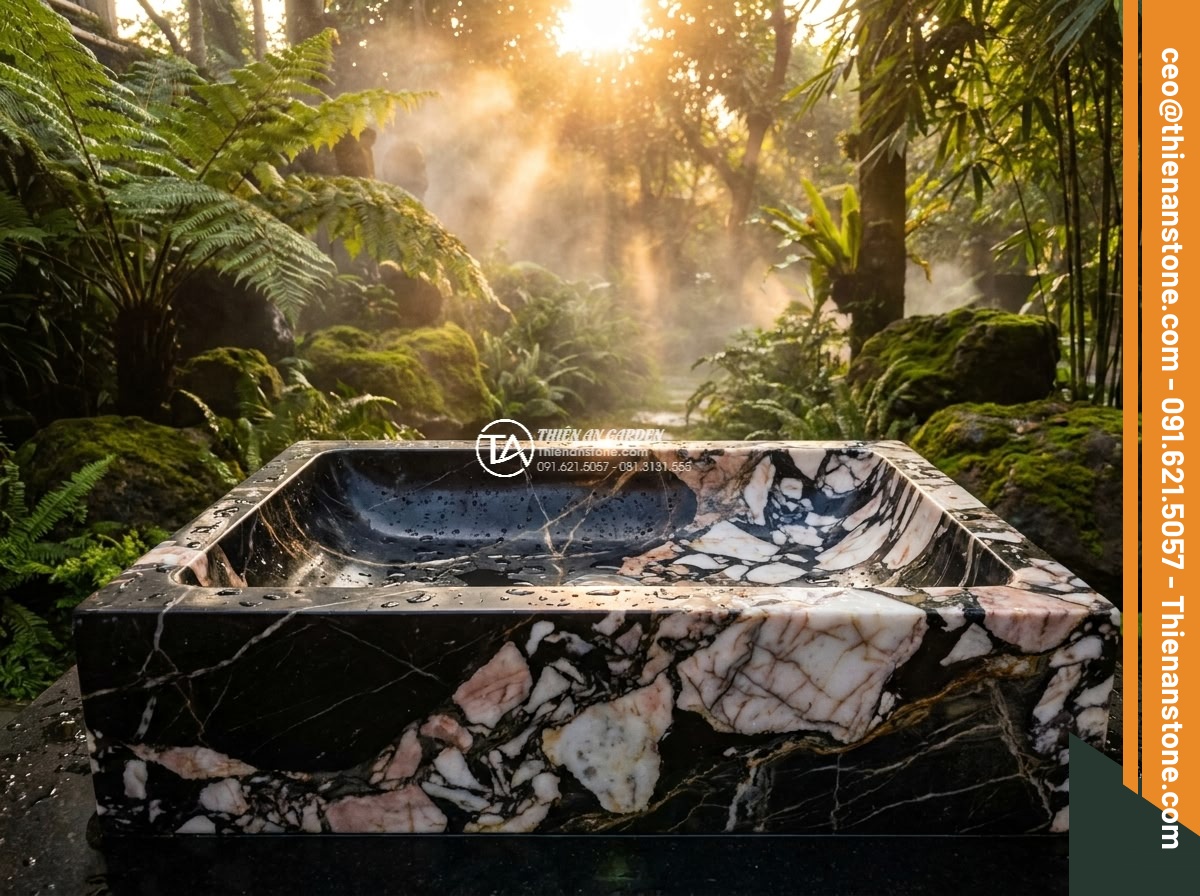 Lavabo đá da báo đỏ tròn phình 42cm (420x420x150mm) - Hình 7 Lavabo đá da báo đỏ tròn phình 42cm (420x420x150mm) - Dramatic low angle shot of the red leopard stone lavabo glowing under warm sunse