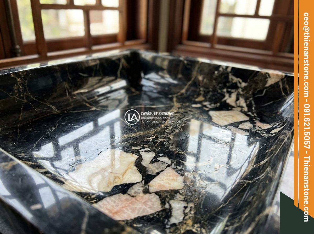 Lavabo đá da báo đỏ tròn phình 42cm (420x420x150mm) - Hình 8 Lavabo đá da báo đỏ tròn phình 42cm (420x420x150mm) - Detailed macro photography of the unique red leopard patterns on the stone surfa