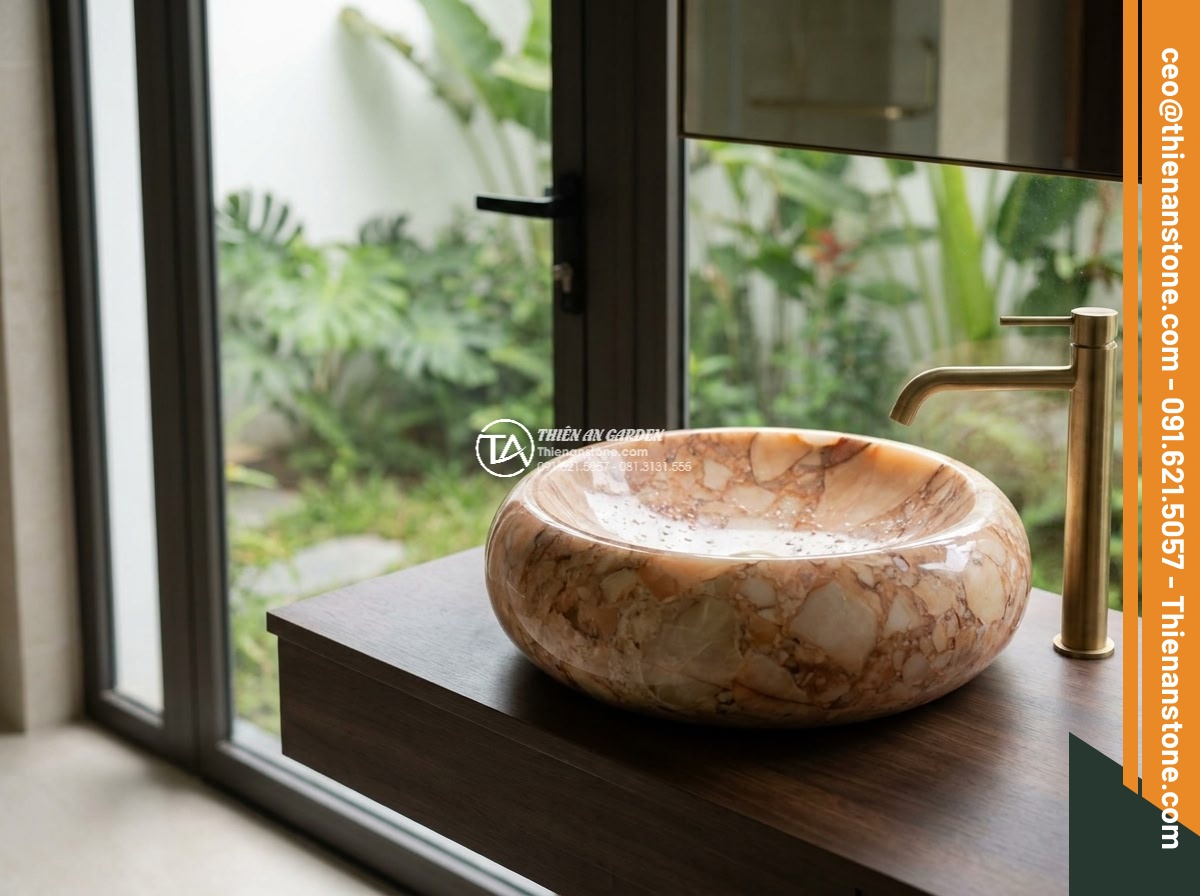 Lavabo đá hồng huyết long tròn phình 42cm (420x420x150mm) - Hình 5 Lavabo đá hồng huyết long tròn phình 42cm (420x420x150mm) - Intimate medium shot approaching the 42cm round bulging lavabo from eye level in