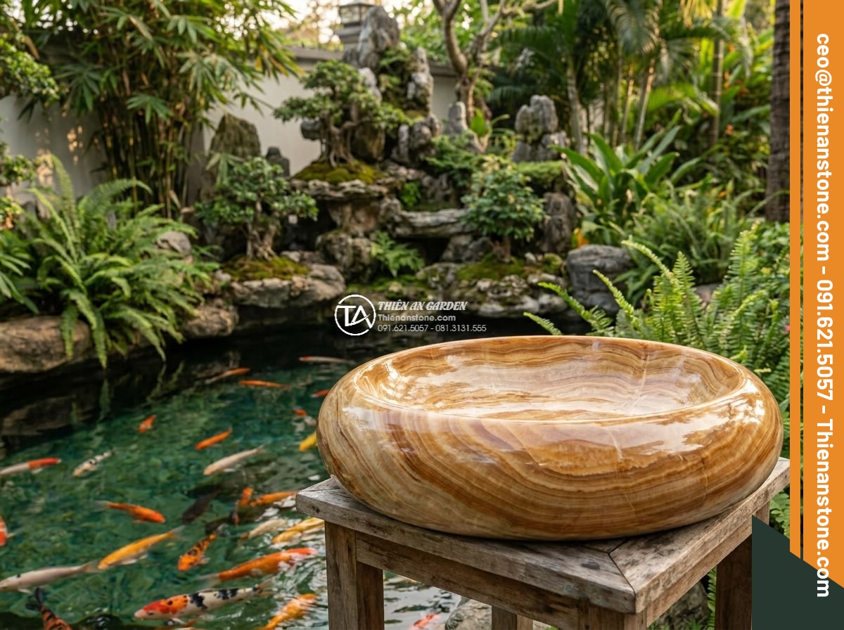 Lavabo đá vân gỗ Oval dài 48cm (480x380x150mm) - Hình 7 Lavabo đá vân gỗ Oval dài 48cm (480x380x150mm) - Beautiful garden composition featuring oval wooden grain stone sink 480mm next t