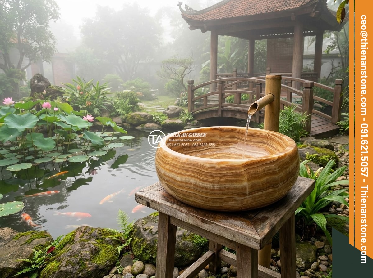 Lavabo đá vân gỗ tròn 42cm (420x420x150mm) - Hình 6 Lavabo đá vân gỗ tròn 42cm (420x420x150mm) - Serene feng shui inspired scene of a round 42cm wood-veined stone sink placed be