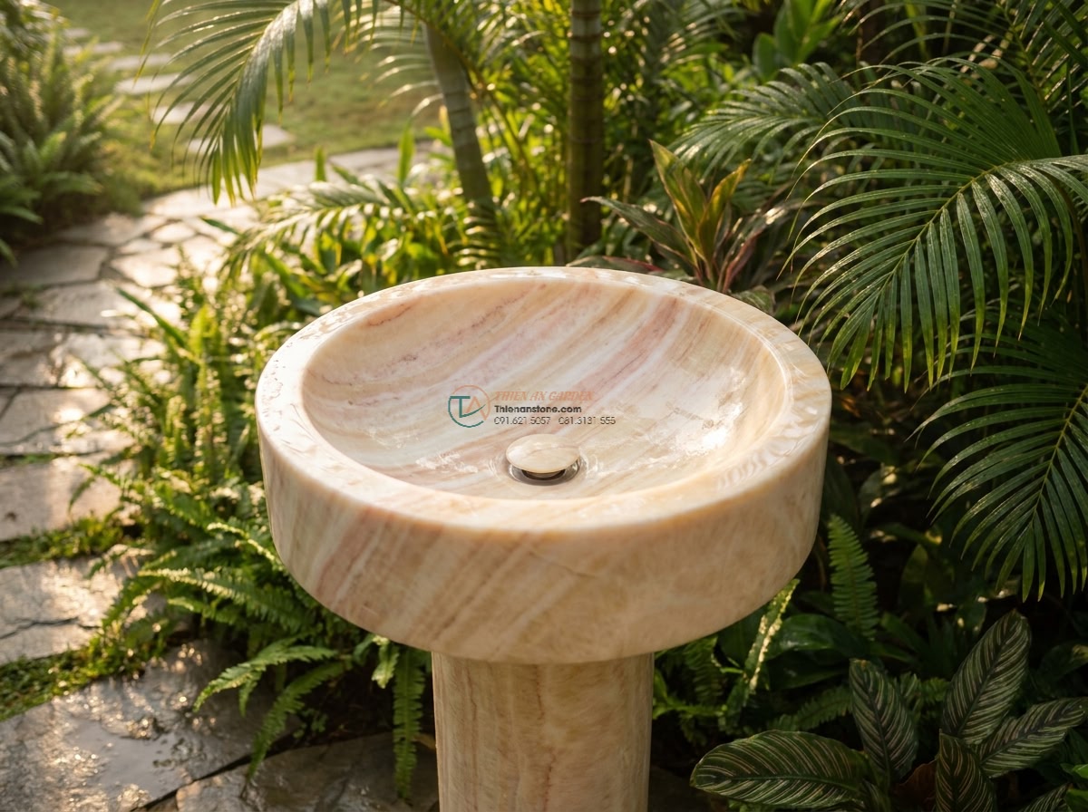Lavabo đá vàng cà rốt tròn 42cm (420x420x150mm) - Aerial view of a premium round 42cm carrot yellow natural stone sink carved from